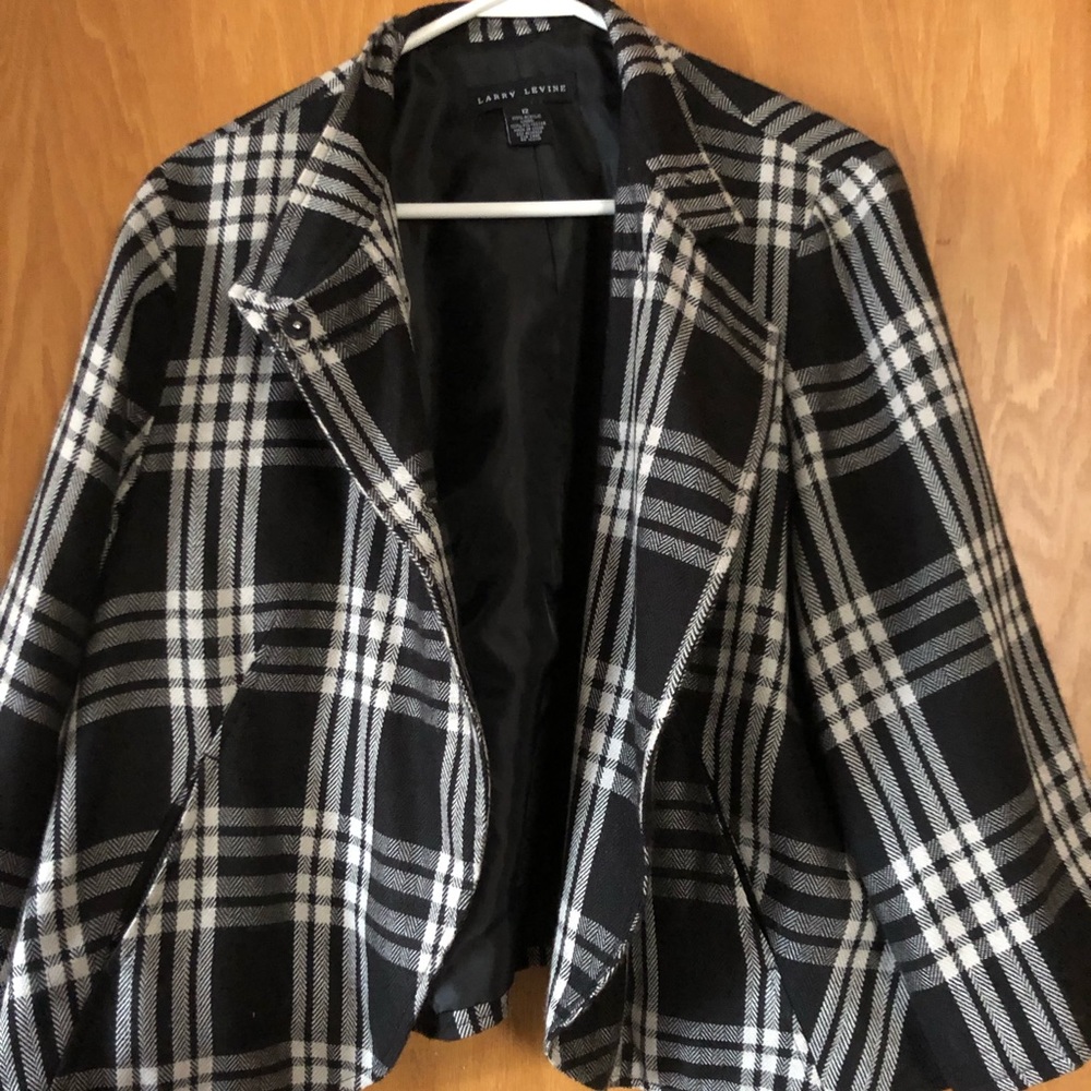 Woman’s black and white blazer